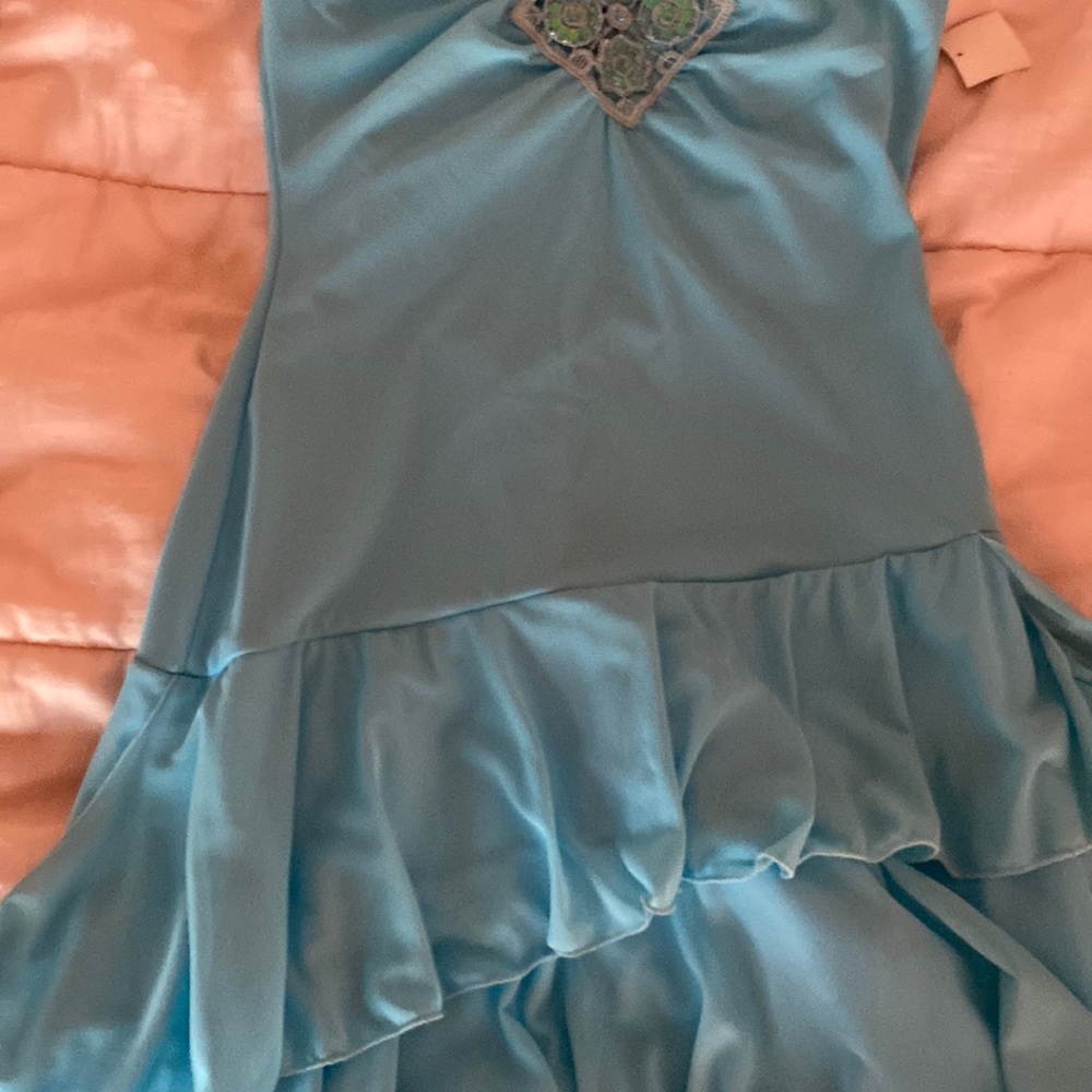 Beautiful turquoise dress spandex material with chiffon layer over